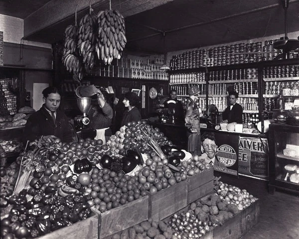 Historical photograph of the family’s shop interior and produce counter, dated 1926 in the business archive