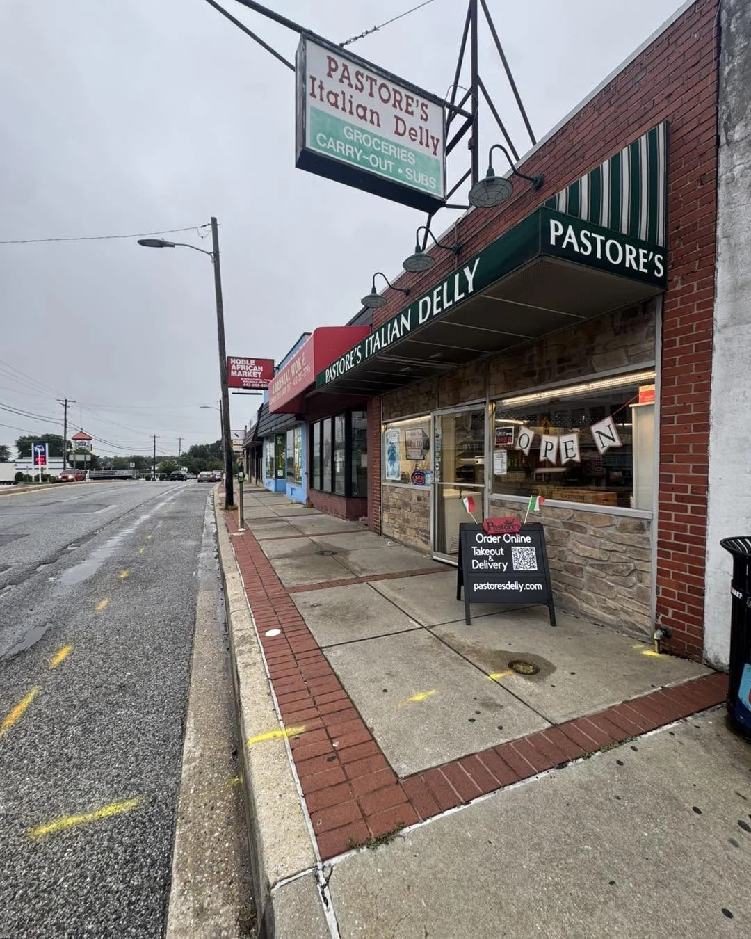 Pastore’s storefront and awning on Loch Raven Boulevard, photographed September 2026